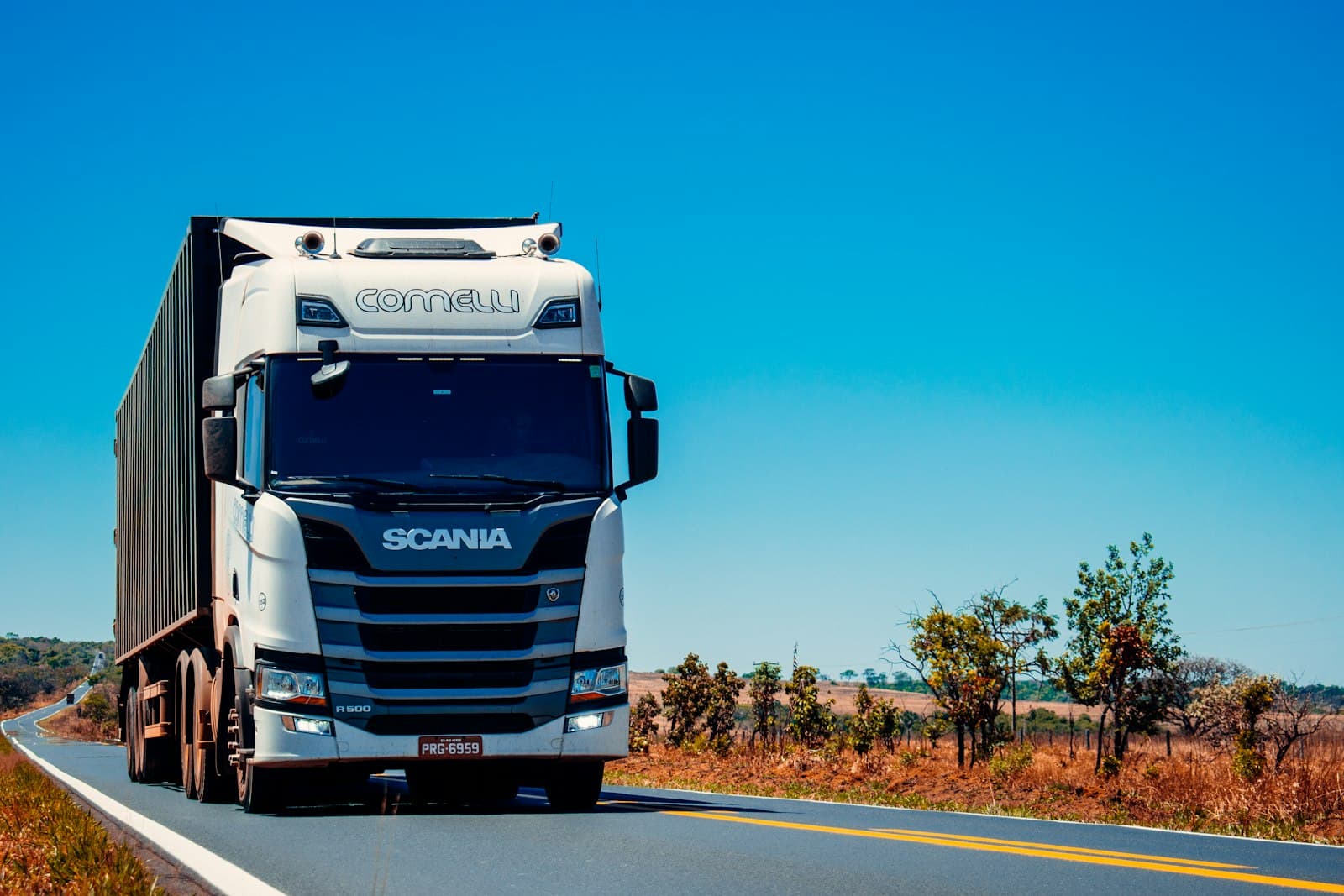Freight truck on the road delivering goods
